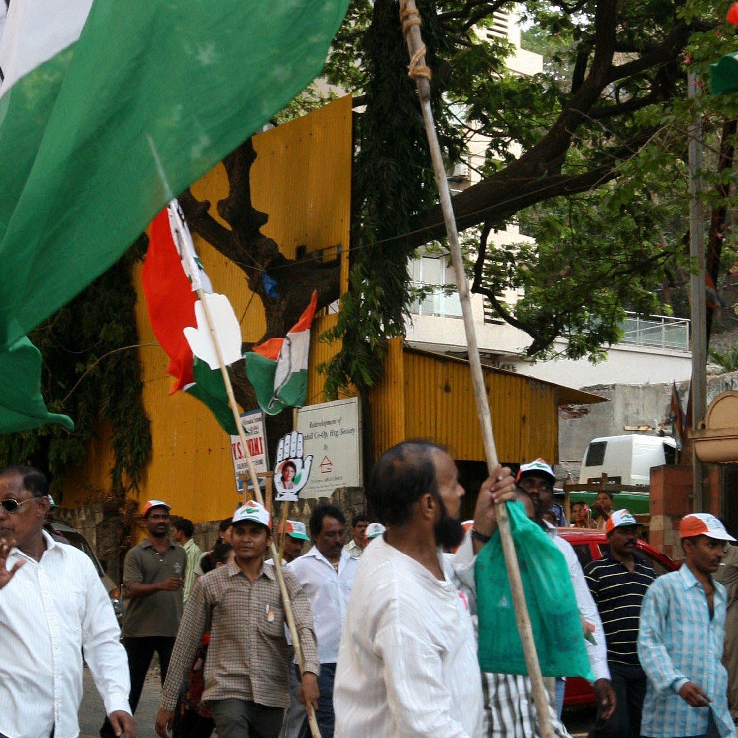 Indian political campaign crowd and volunteers